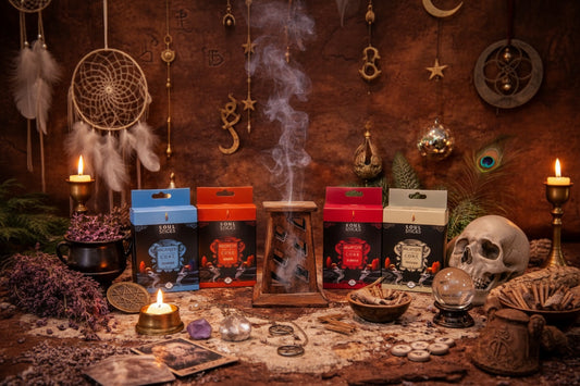 Witchcraft-themed setup with boxes of Soul Sticks incense cones, candles, and mystical items on a wooden surface.