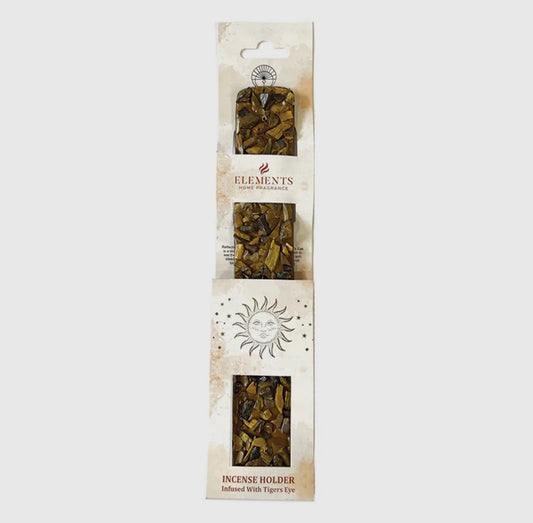 Incense holder with tiger eye stones on a white background