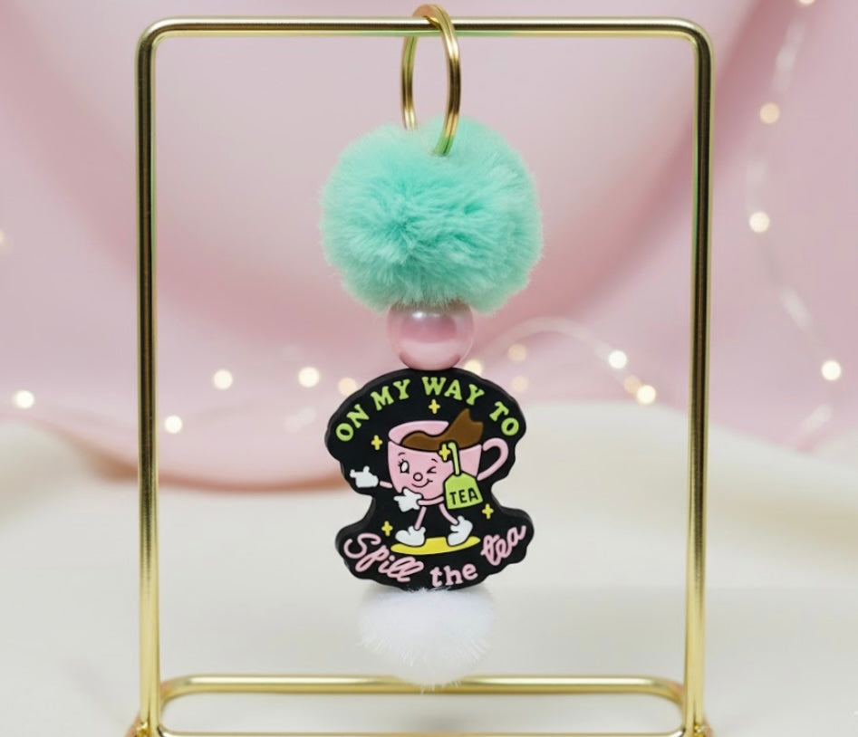 Customizable keychain on a white background. Ethereal By Lez. 