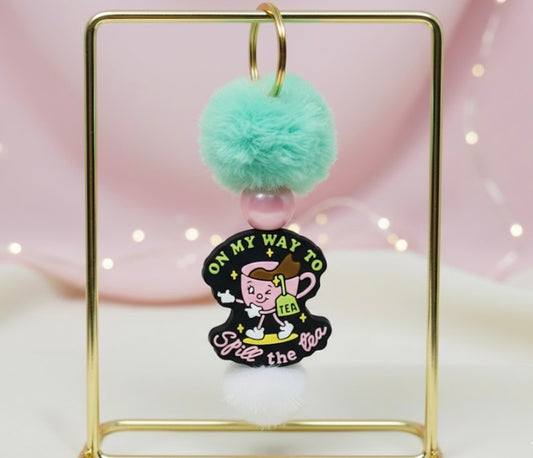 Customizable keychain on a white background. Ethereal By Lez. 