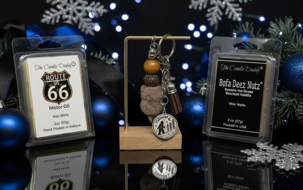 Big Foot Keychain with decorative elements on a stand, surrounded by wax tarts labeled 'Route 66 Motor Oil' and 'Bofa Deez Nutz'.