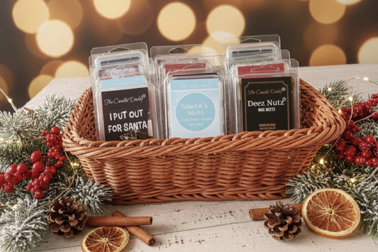 Wicker basket with holiday-themed wax melts on a wooden surface with festive decorations.