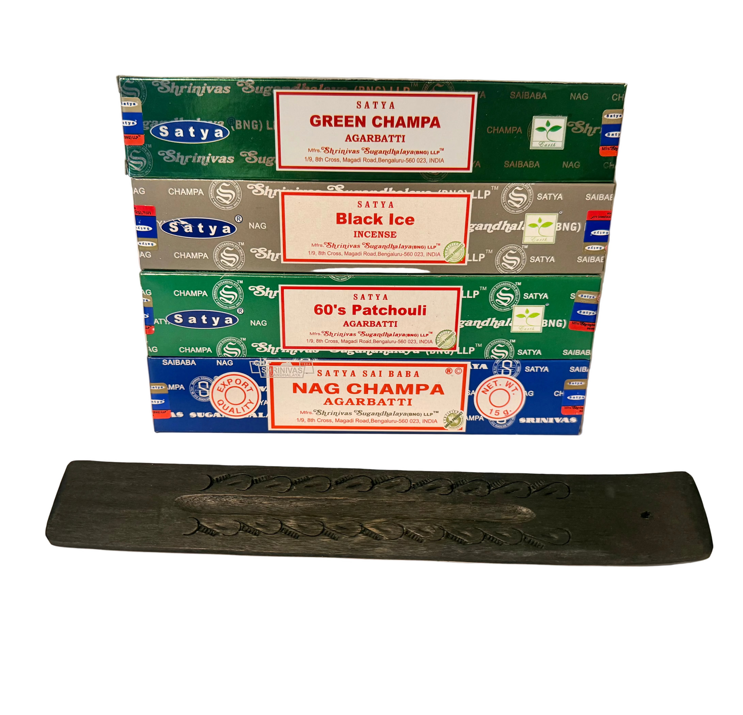 Collection of Satya incense boxes with a black holder on a white background