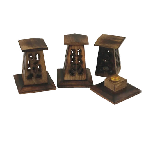 Set of three 4” wooden incense burners on a white background