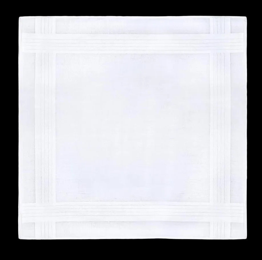 White cotton handkerchief with subtle pattern on a white background