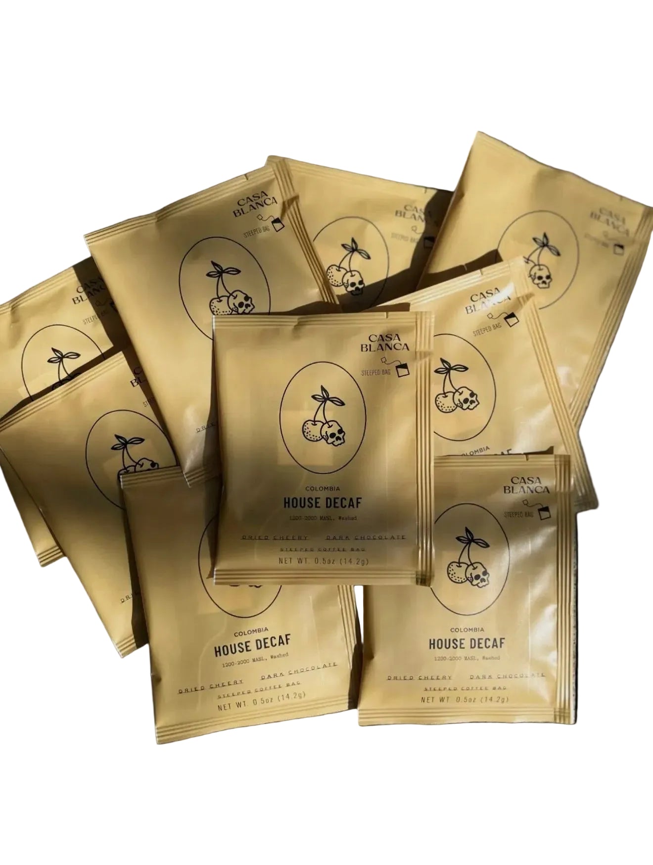 Gold steeped coffee packages with branding on a white background