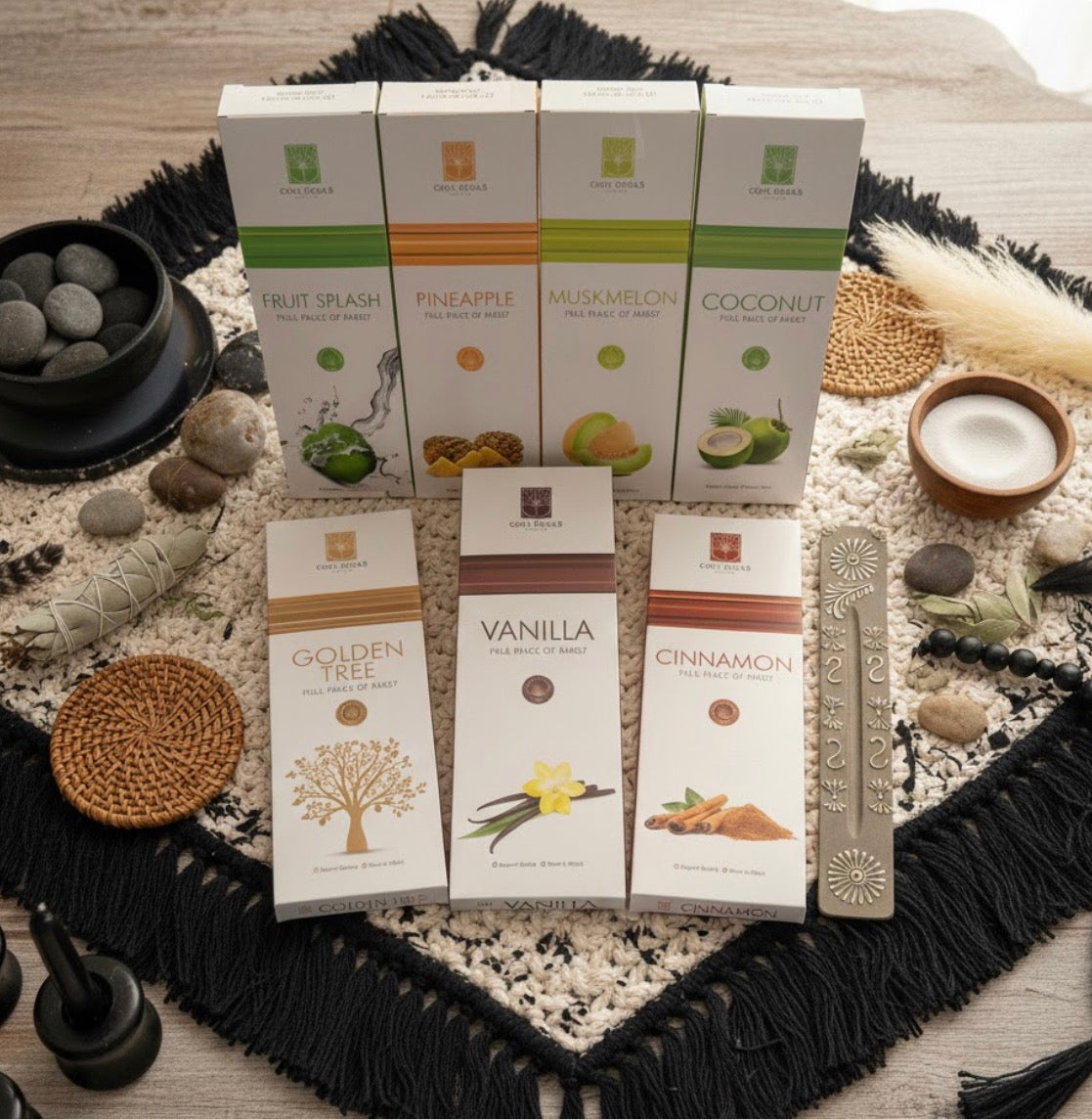 Collection of incense boxes with various flavors on a textured surface