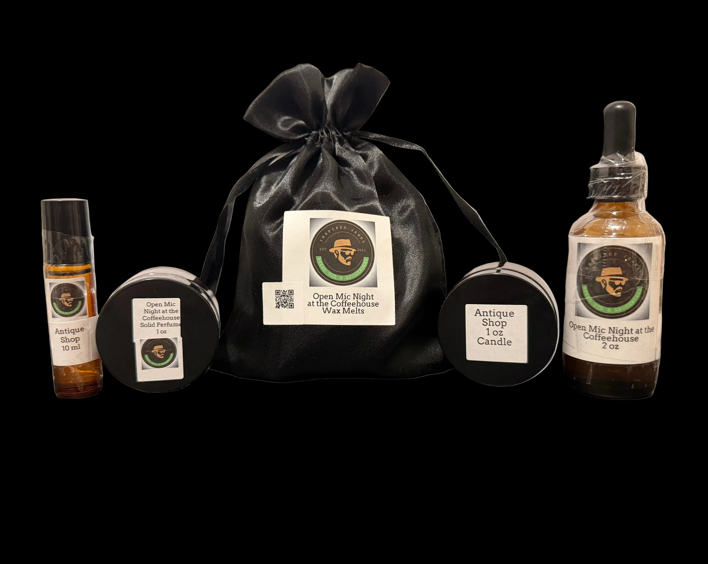 Collection of essential oils wax melts and candle with a black drawstring bag on a gray background