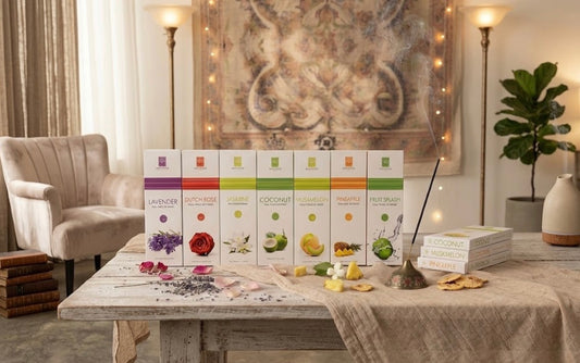 Table with boxes of Soul Sticks Incense and decorative items in a cozy room setting
