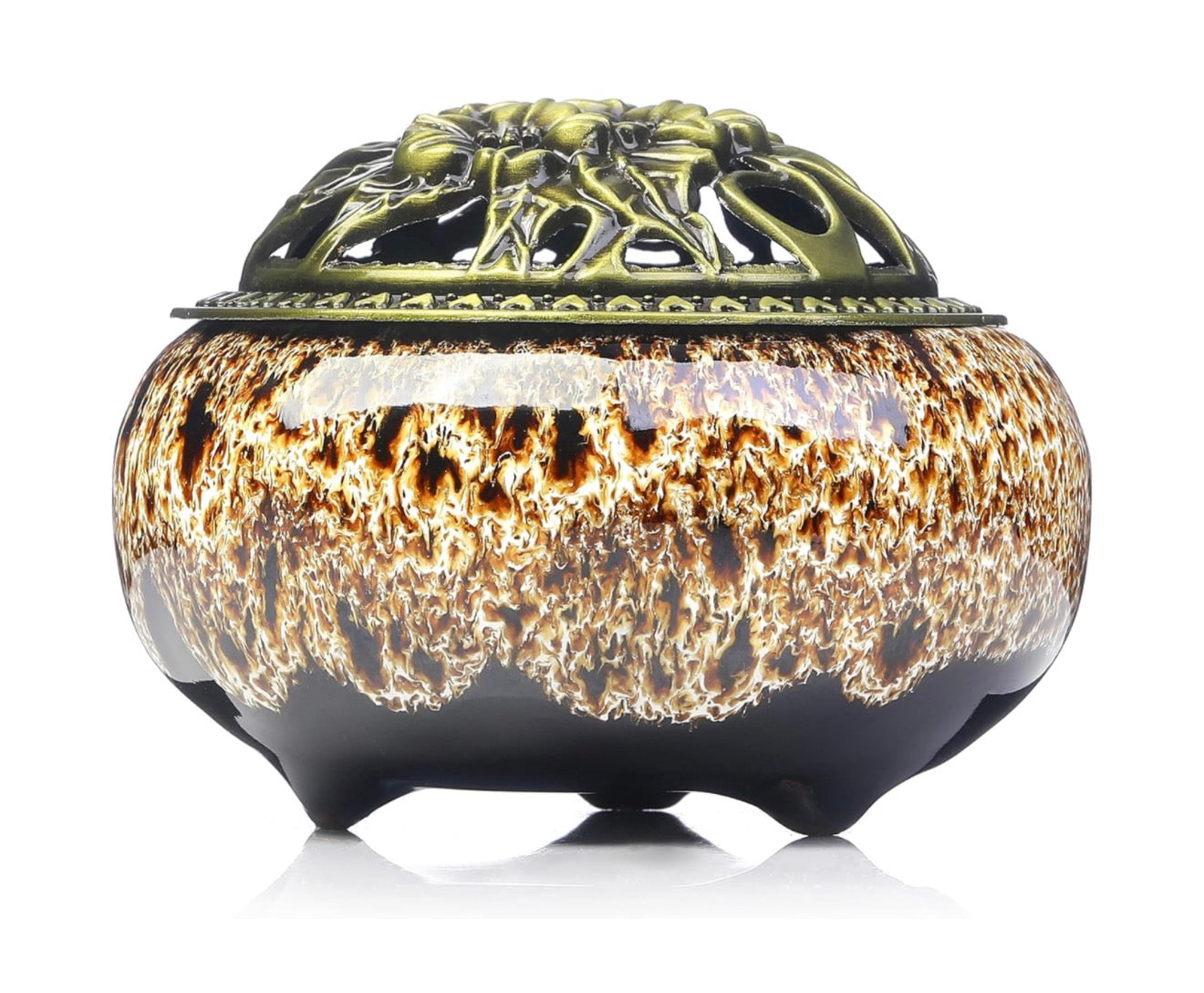 Decorative ceramic incense burner with a bronze decorative lid on a white background