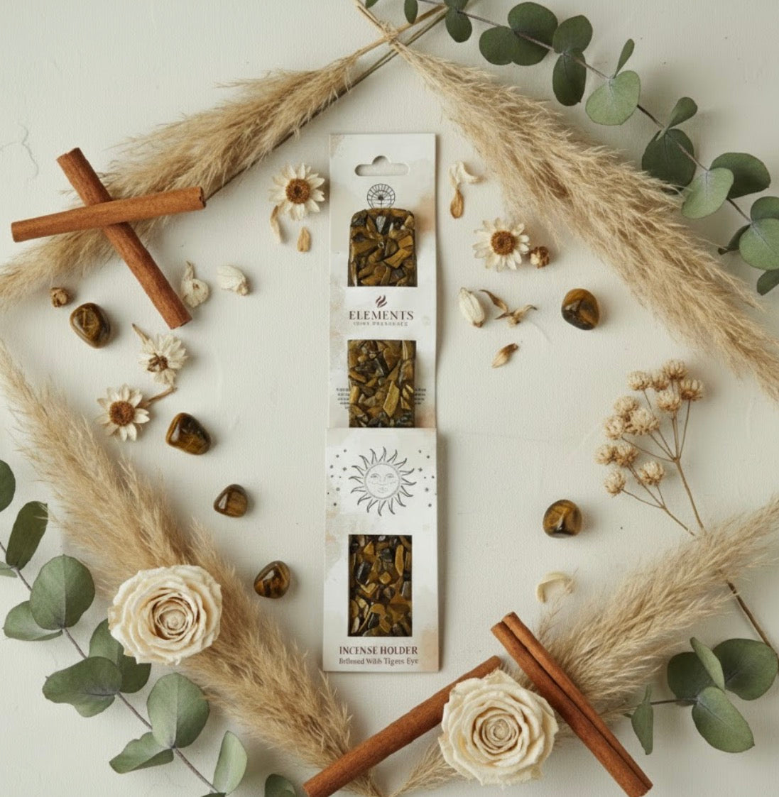 Incense holder packaging with decorative elements on a light background