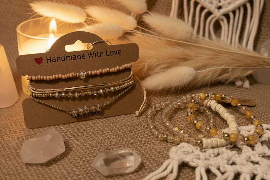 Handmade 7-piece jewelry set on a decorative card with candles and feathers in the background