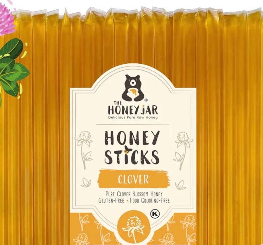 Pack of Honey Sticks with a label on a white background