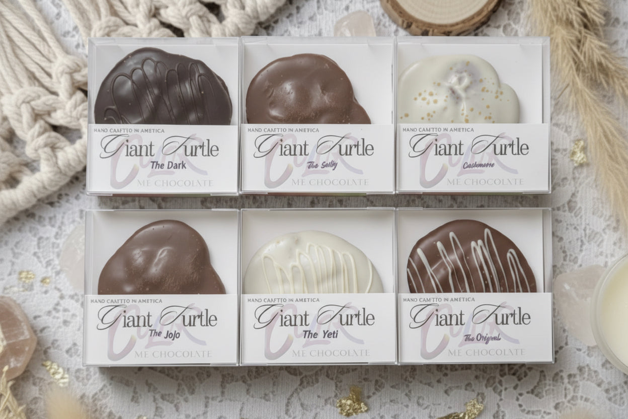 Chocolate turtle candies in various flavors with packaging on a textured surface.
