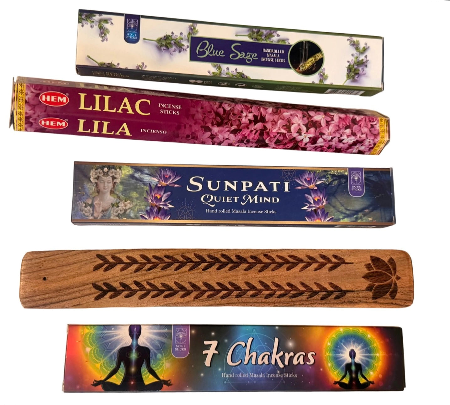 Collection of incense sticks packaging with a wooden incense stick holder on a white background