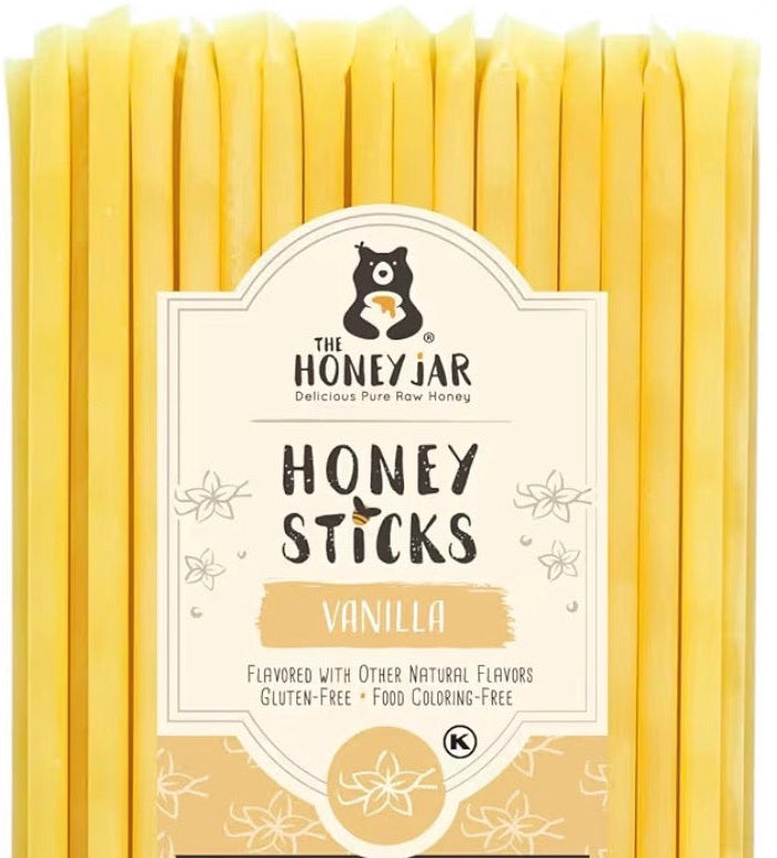 Pack of honey sticks with vanilla flavor packaging on a white background