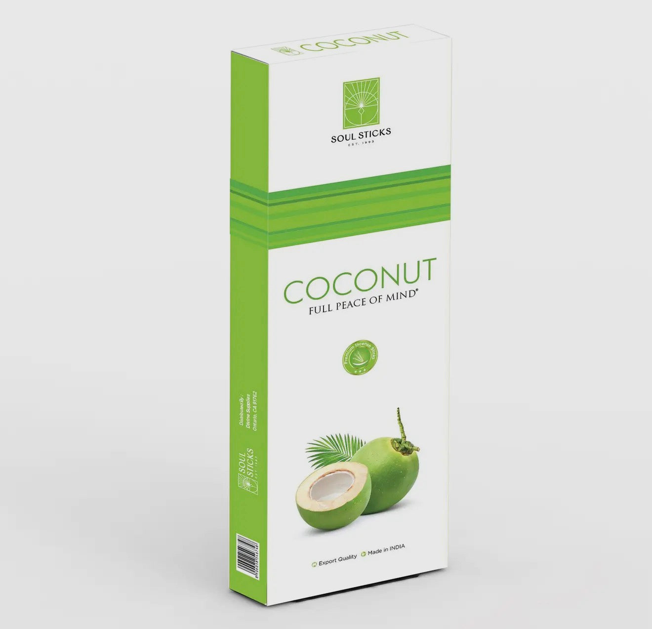 Box of Coconut incense with green and white design on a light gray background
