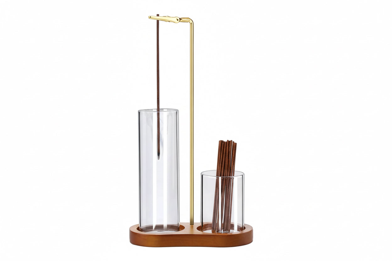 Stainless steel incense holder with wooden base on a white background